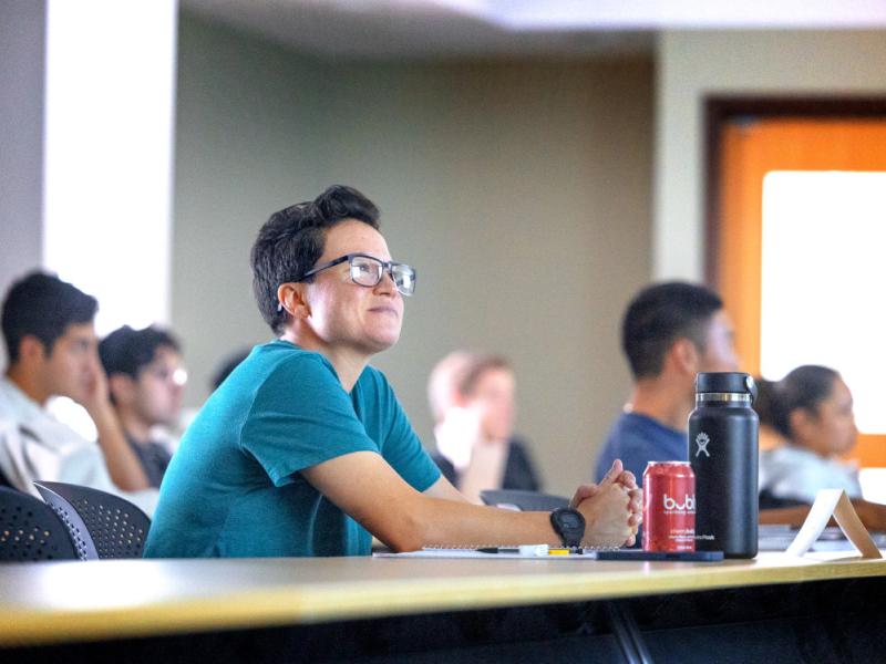2022 Warrior-Scholar Kristy Callis, Marine Corps veteran, observes a lecture on 'Searching for Life in the Universe' with Dr. Shami Chaterjee during the Cornell Warrior-Scholar STEM Week lecture series.