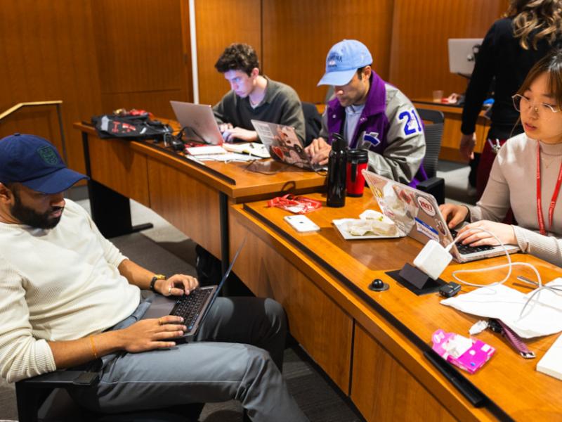 Students work on presentations during Cornell’s inaugural Legal Information Institute Hackathon in Myron Taylor Hall.