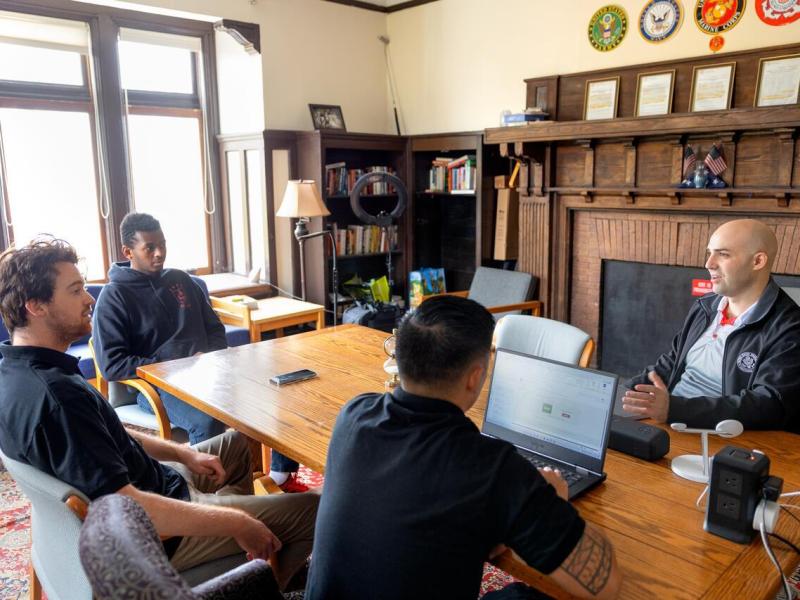 Student Veteran Outreach Peer Counselors meet in the Veterans Program House on University Ave.